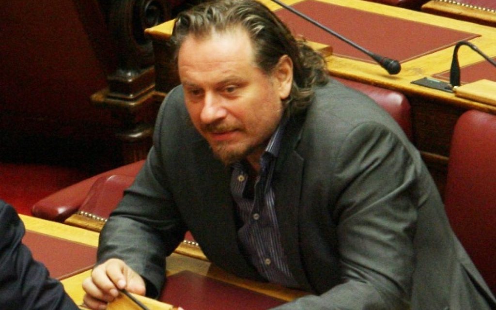 AT OIKONOMOY